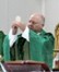 A person in a green robeAI-generated content may be
        incorrect.