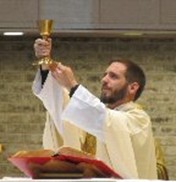 A person in a robe
        holding a gold cupAI-generated content may be incorrect.