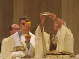 A group of men holding up a
        wine glassAI-generated content may be incorrect.