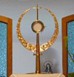 A gold statue with a cross
        on topAI-generated content may be incorrect.