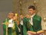 A group of men in
        green robes holding a cupAI-generated content may be incorrect.