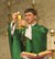 A person in green
        robe holding a gold cupAI-generated content may be incorrect.